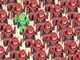 one green toy robot amidst many red toy robots